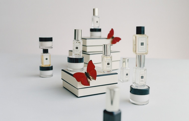 Jo Malone London home candle with little snowmen and snowglobes