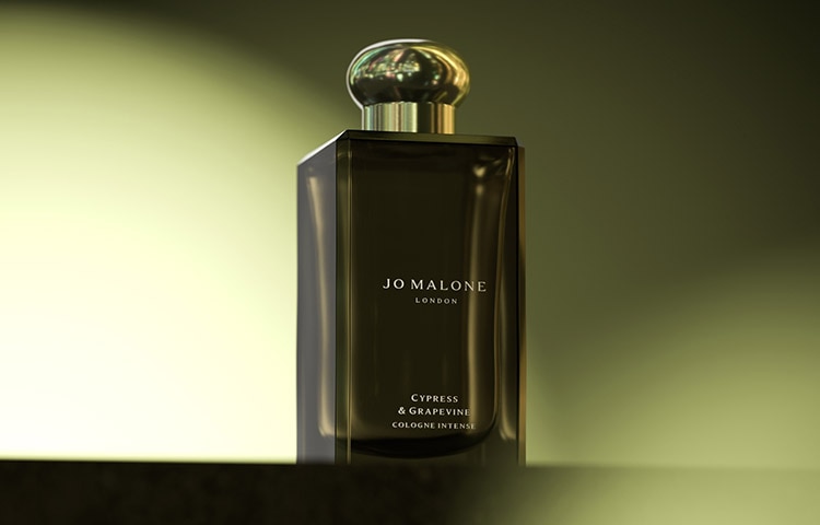 Jo Malone London Cypress & Grapevine Cologne Intense on green background